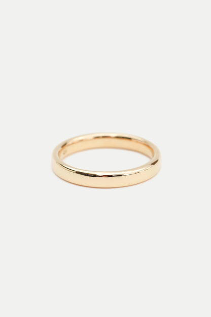 A simple 3mm gold band ring displayed on a white background.